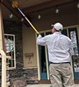 colorado springs exterminator removing spider webs