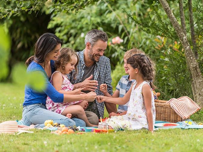 family enjoying being outside in colorado without mosquitos or ticks driving them inside