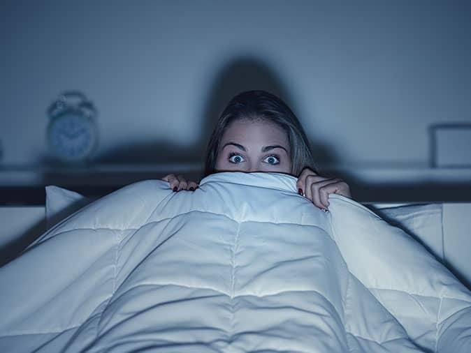 Professional Bed Bug Control Services In Denver, Colorado homeowner awake because bed bugs are active inside their denver home