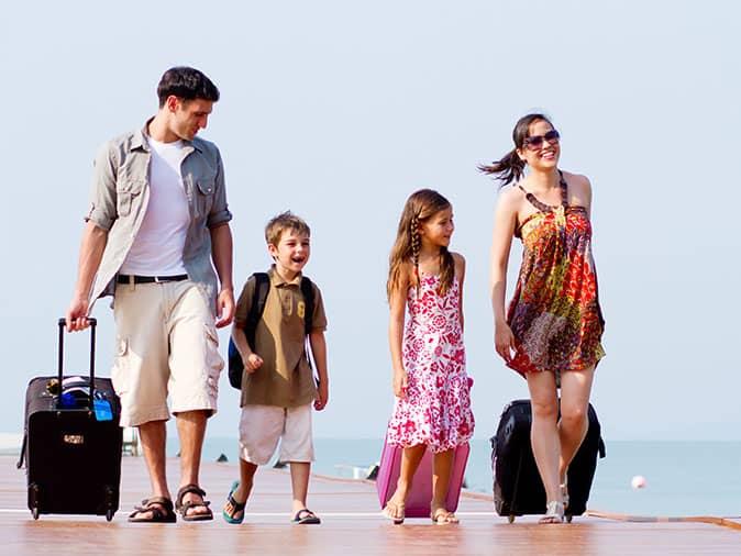 denver family arriving at hotel for summer vacation