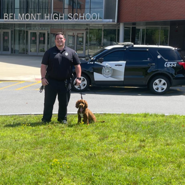 Belmont Police officer Brian Conneely and Comfort Dog Bing