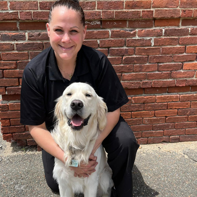 Northeastern University Police Officer Rachel Jolliffe and Community Resource Dog Cooper