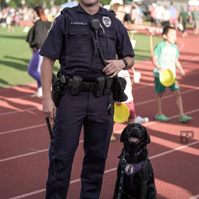 Tufts University Police Officer Robert Moschella and Comfort Dog Pepper
