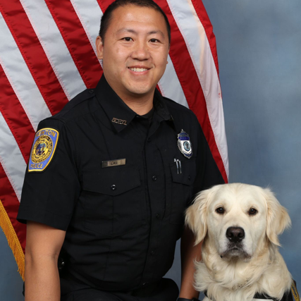 Newton Police Officer Justin-Lau and Community Resource Dog Leo