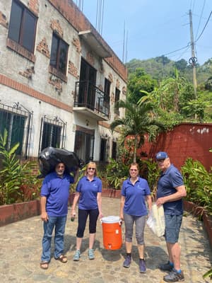 The team delivers supplies to a high school.