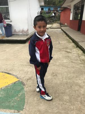 A boy in his school uniform