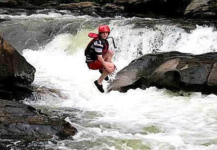 Goofing around beneath the falls (Credit: NOC STAFF)