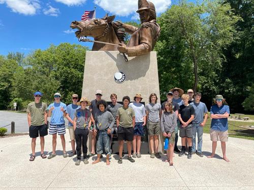 Scouts from Troop 523 stop for a photo op at the Francis Marion statue at Venters Landing