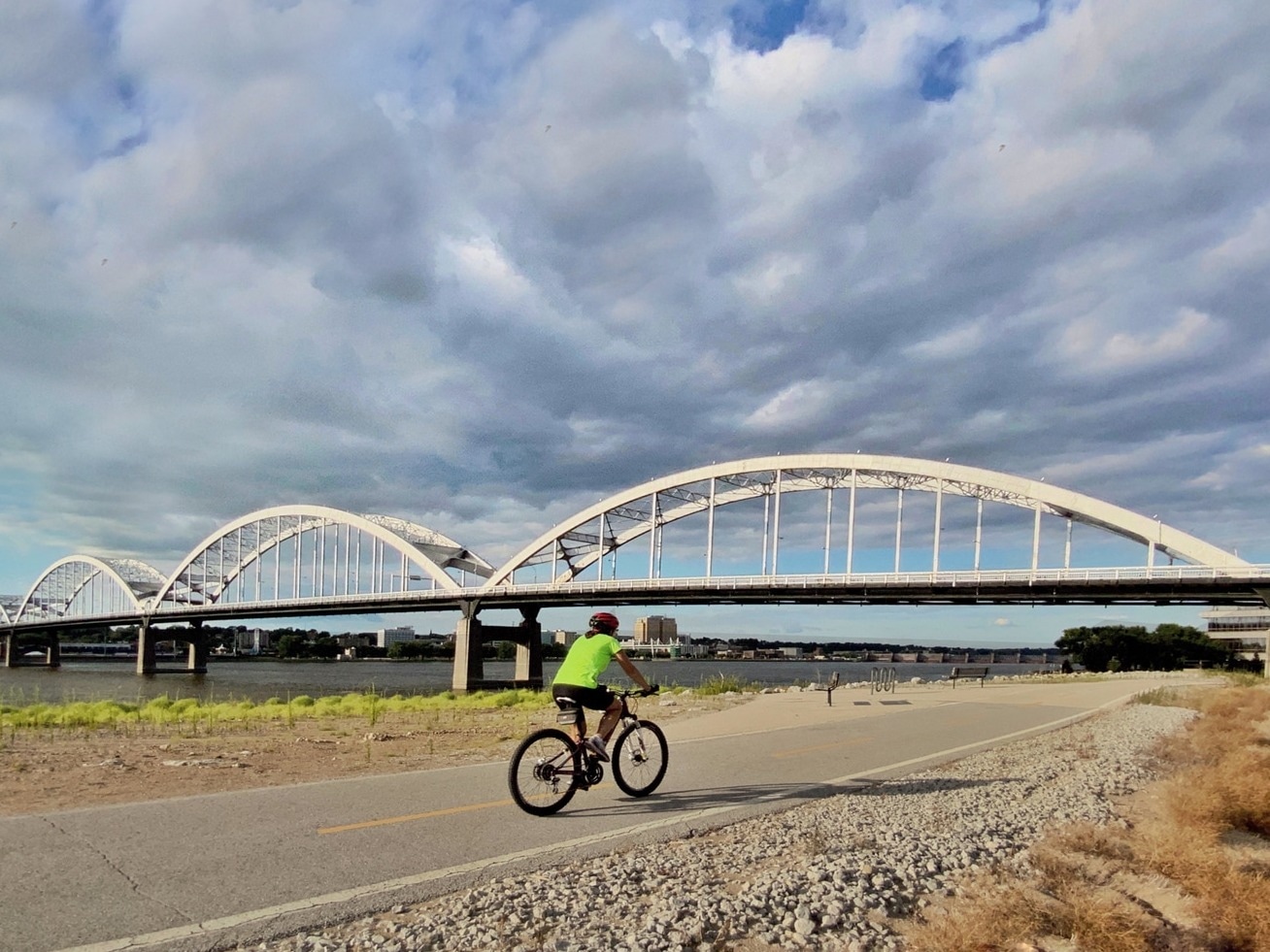 bike riding on a paved trail