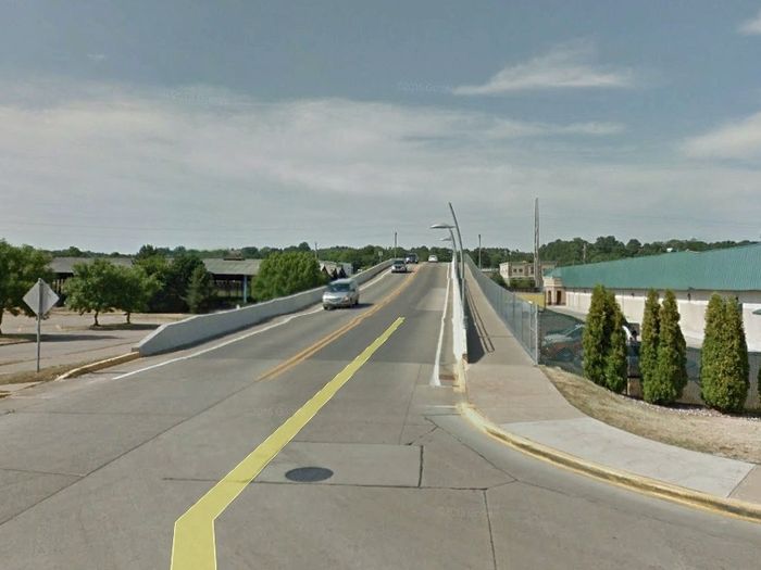 This 6-foot sidewalk is a bridge crossing over railroad tracks.