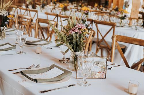 Several table settings in a row