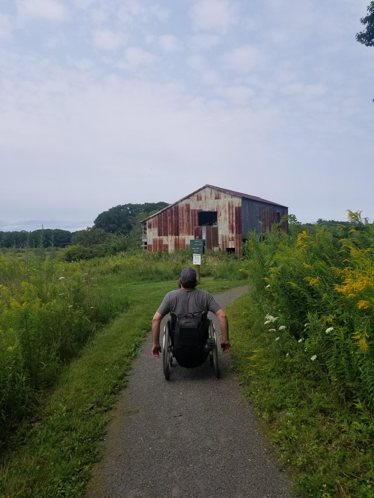 Enock heading toward the old barn at Pleasant Hill Preserve. Photo credit: Enock Glidden