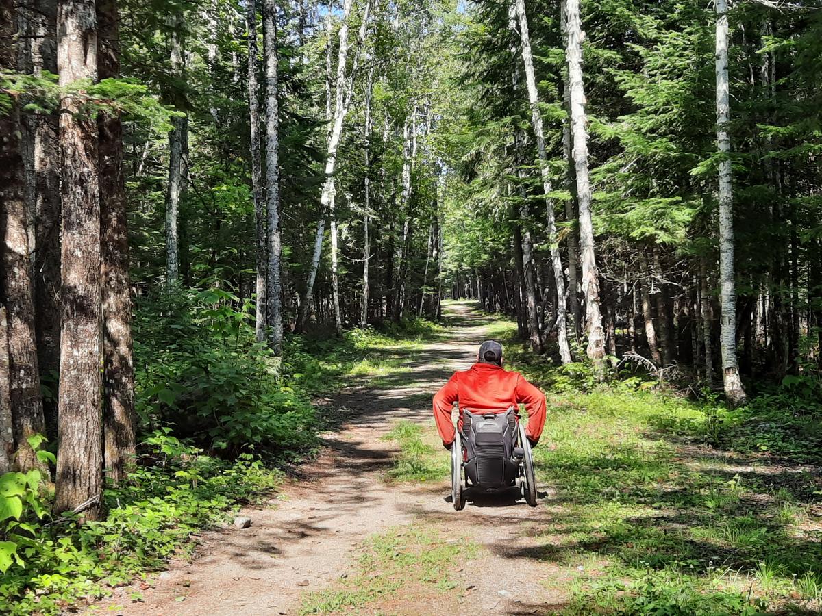 A smooth section of the Rangeley River Trail. Photo credit: Enock Glidden