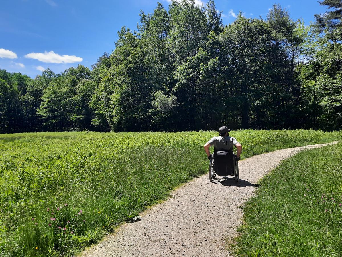 Enock starting down the trail.