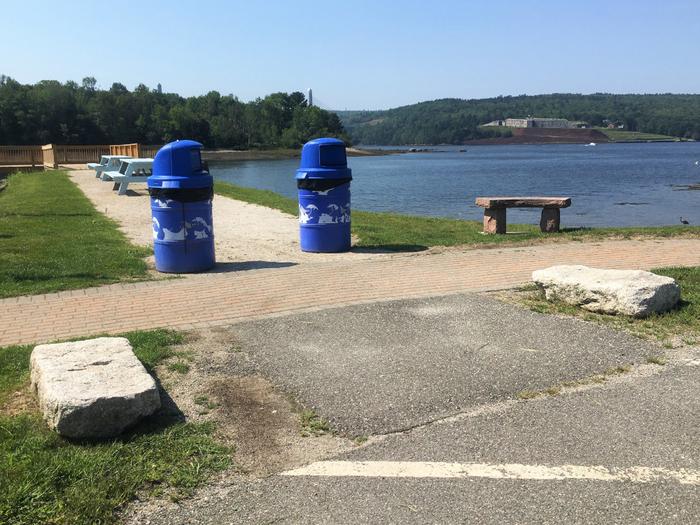 Trail entrance from parking area at east end of walkway