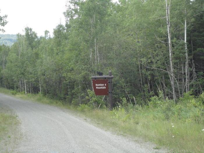 August 2018, parking lot past trailhead on right (Credit: Remington34)