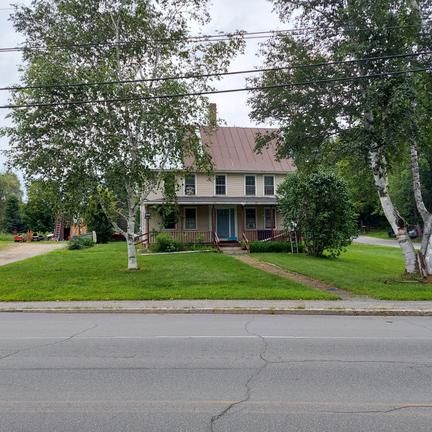 3 unit building that could easily be converted into a single family 4 bedroom home in Wilton!