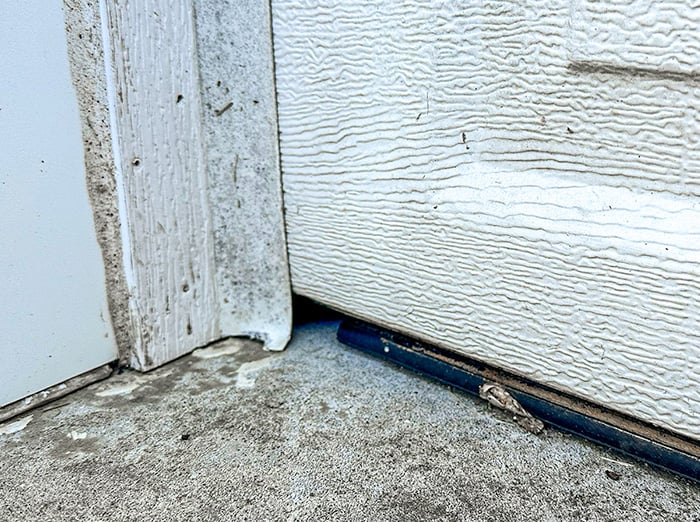 gap under garage door that rodents could use to get inside