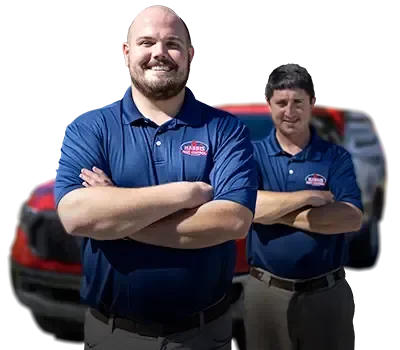 employees in front of truck