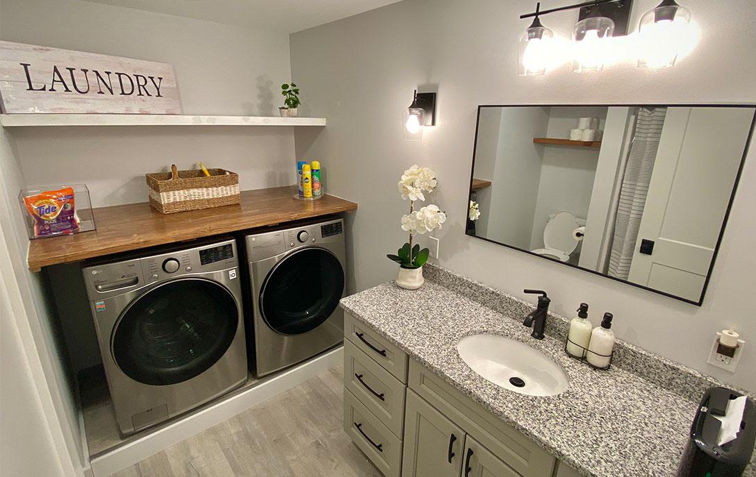 laundry room with sink in cabin