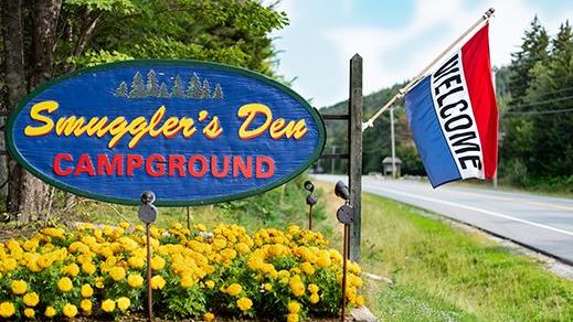 smuggler's den campground sign