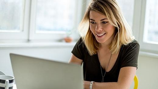 lady emailing for campsite reservation