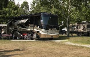 full hook up site with cement pad for rvs at campground near acadia national park