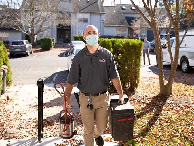 a new jersey pest control expert servicing a home