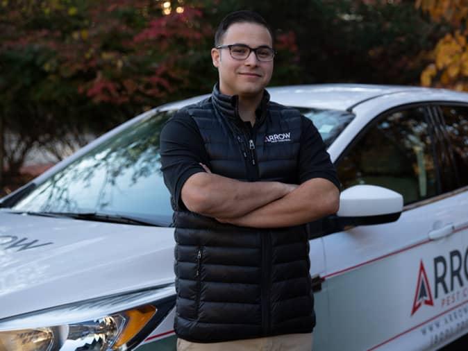 pest control tech in front of bed bug control vehicle providing service to all of new jersey