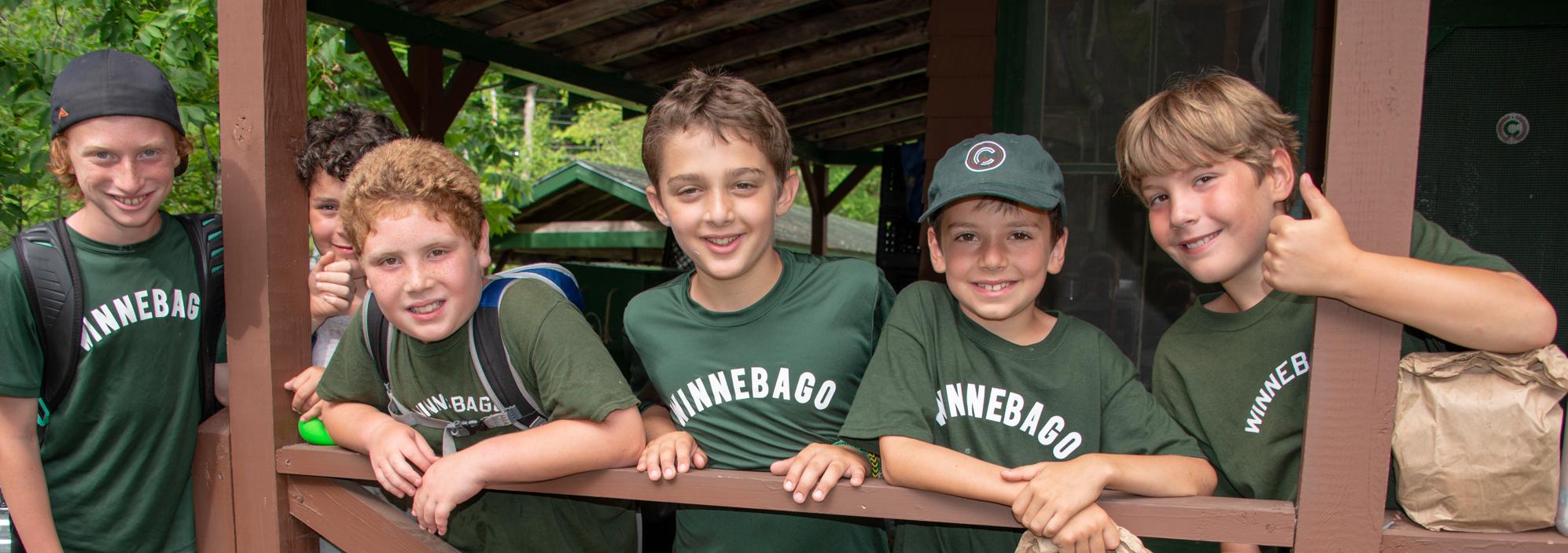 Boys in front of Cabin