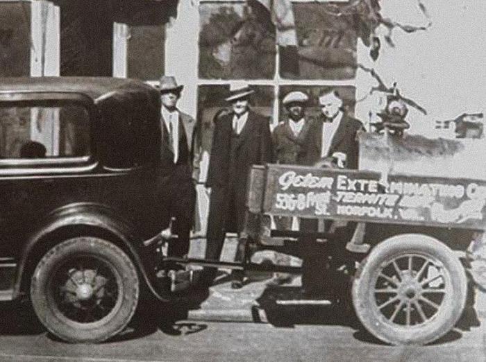 old photo of getem services' truck and team