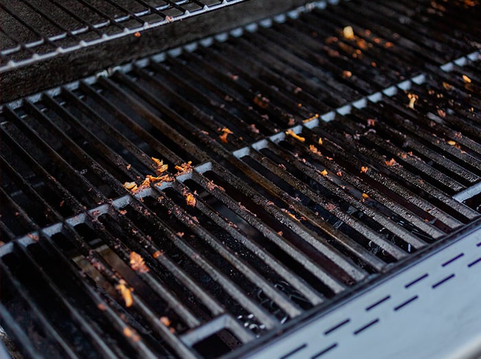 dirty grill with food and grease attracts bugs