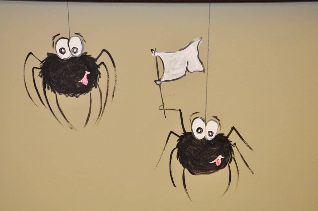 Spiders surrender at All-American Pest Control offices spider mural at All-American Pest Control
