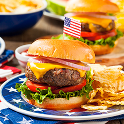 cheeseburger at a 4th of july bbq