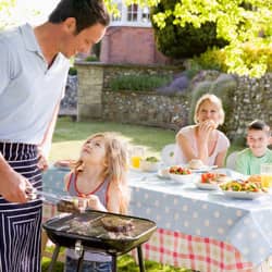 family enjoying BBQ