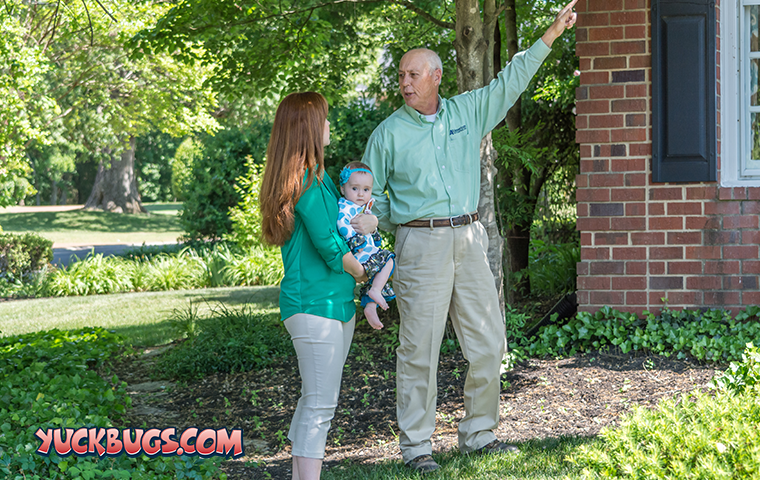 pest expert reviewing findings with homeowner
