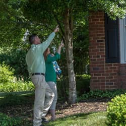 all-american tech doing a home inspection with customer