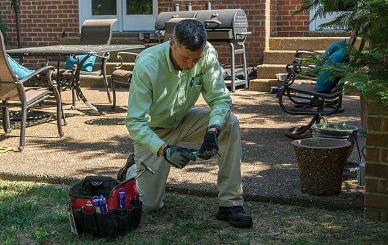 technician checking sentricon station