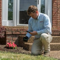 technician servicing the outside of a nashville home