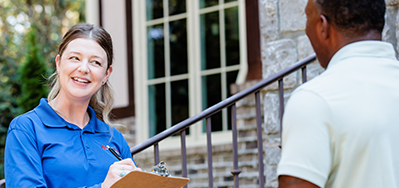 pest expert talking to customer