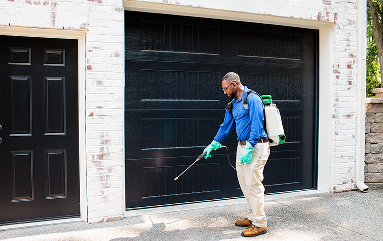 pest control technician treating a brentwood tn home