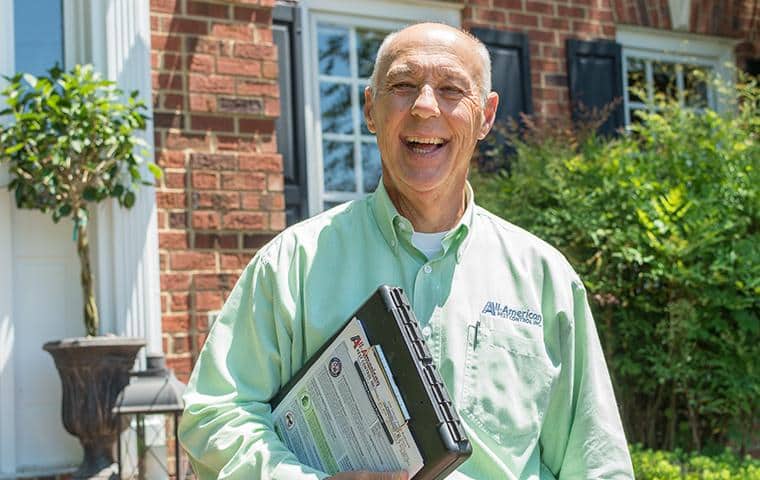 Termite Protection With Termite Damage Repair Guarantee all-american termite control pro in front of nashville home