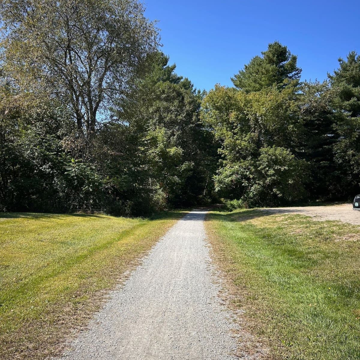 Gravel path through field