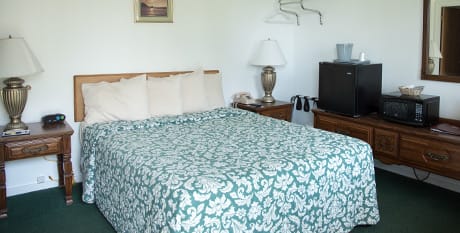 Book Your Room Today At Acadia Sunrise Motel room with queen bed near acadia national park