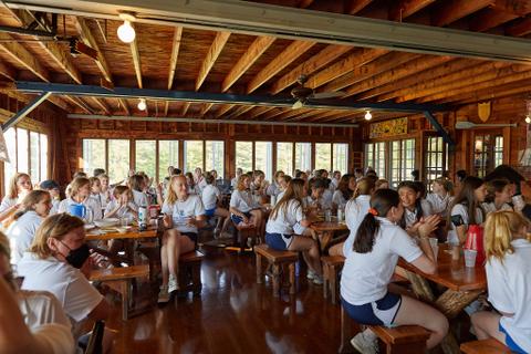 Campers enjoy lunchtime in the Dining Hall at Camp Tapawingo in Maine.