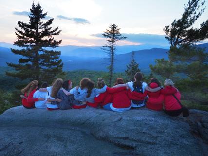 A group of girls from Camp Tapawingo, Maine, enjoy a mountain view.