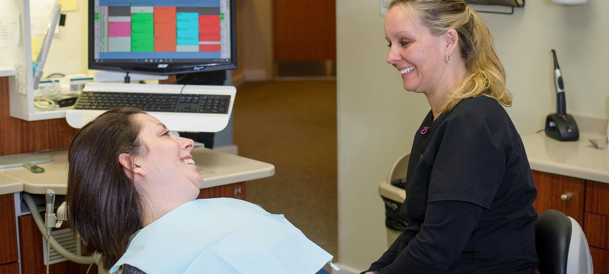 Assistant with patient