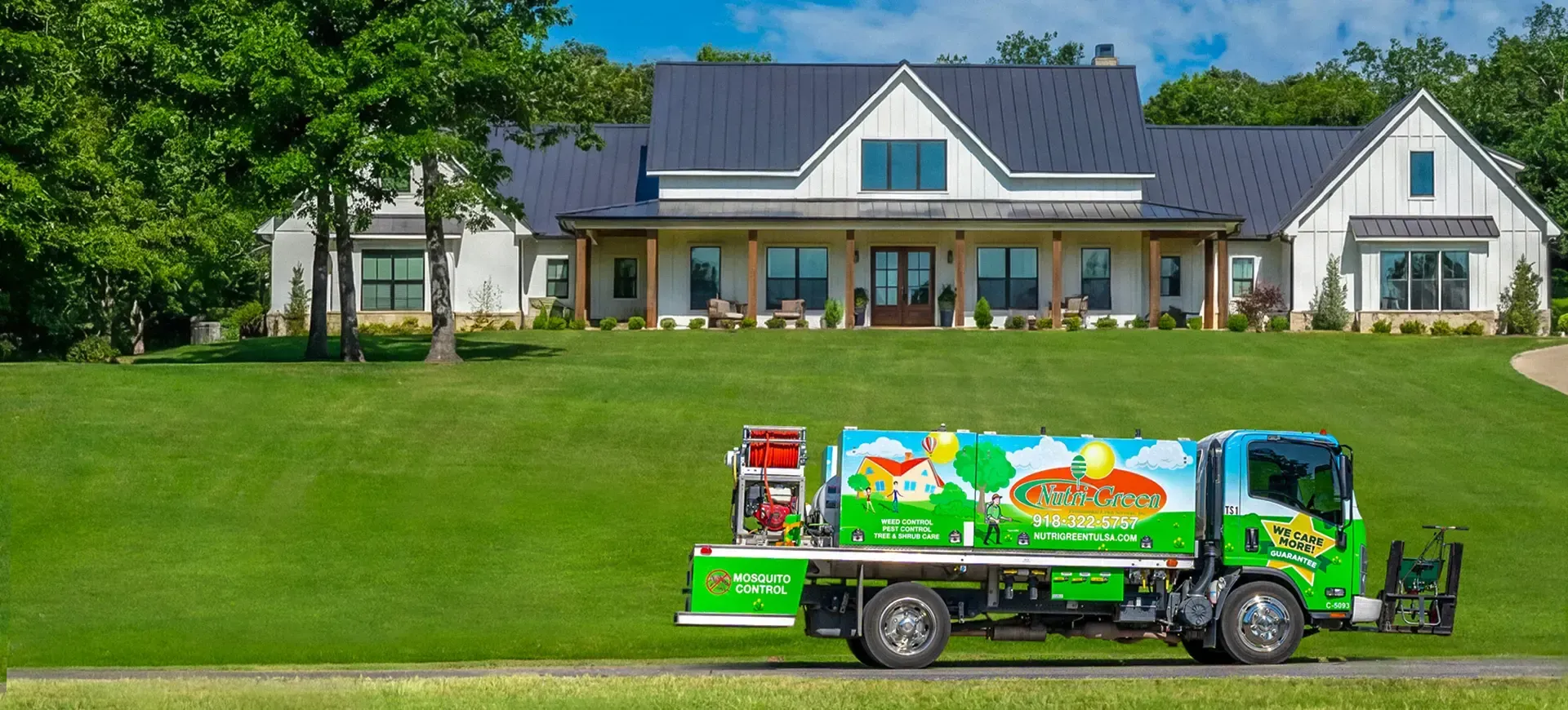 home in tulsa oklahoma with a beautiful green lawn