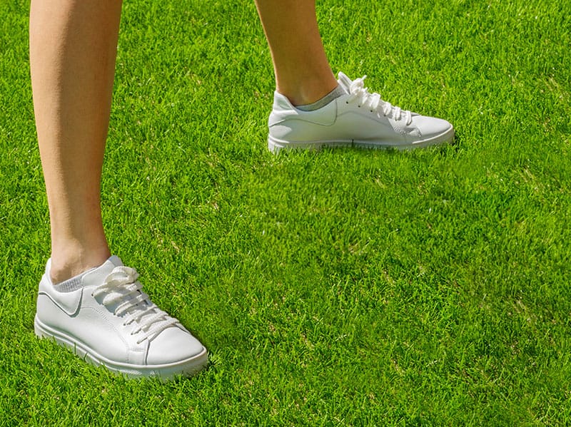 oklahoma resident standing on green lawn